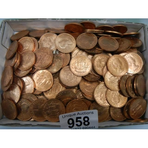 958 - A quantity of mainly uncirculated pre-decimal half pennies.