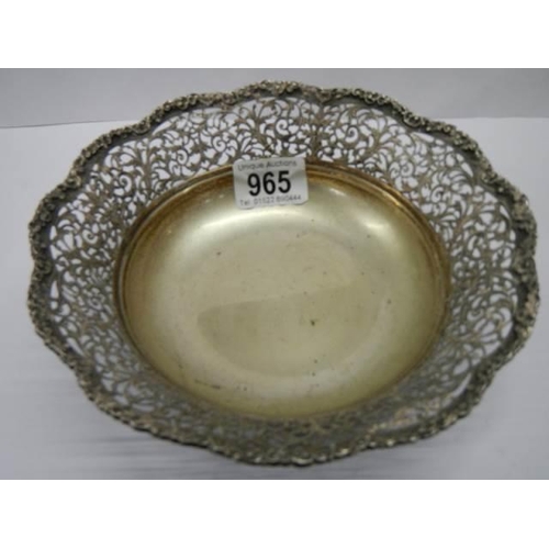 965 - An old white metal bowl with fretted rim (not marked put possibly silver).