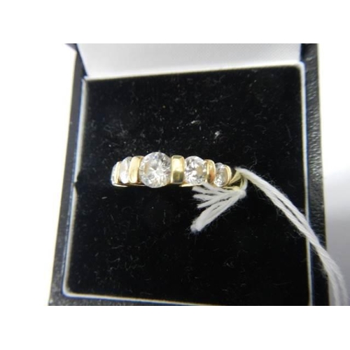 975 - A silver gilt ring set CZ, size P, 3.9 grams.