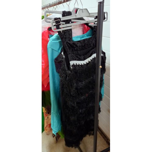 700B - A good lot of fancy dress costumes including many Christmas related costumes and items COLLECT ONLY