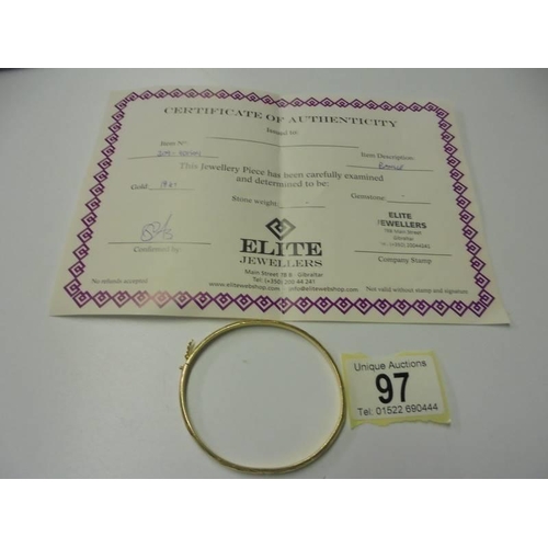 97 - An 18ct gold bangle with certificate, 7.5 grams.