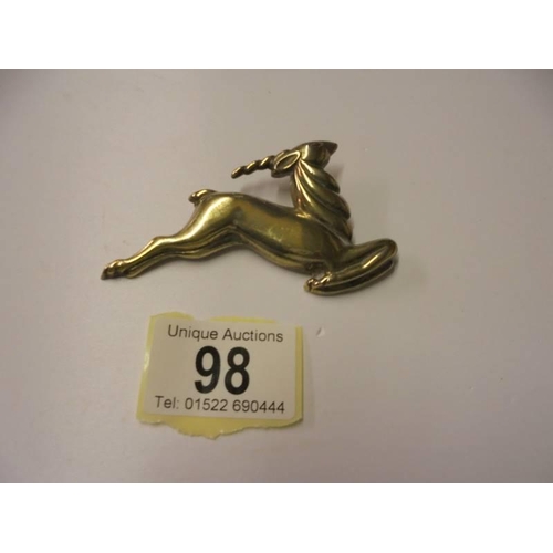 98 - A silver gilt antelope brooch marked Monet, Sterling.