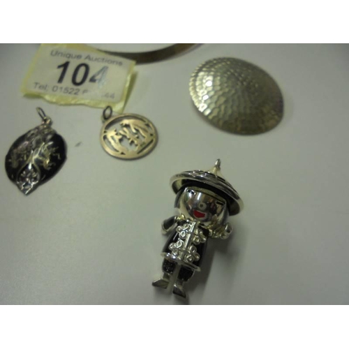 104 - A silver pendant with matching earrings, 4 silver pendants, a silver choker and a Chinese figure pen... 