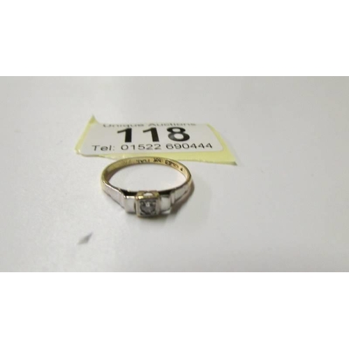 118 - A 9ct gold and platinum diamond ring, size L half, 2 grams.
