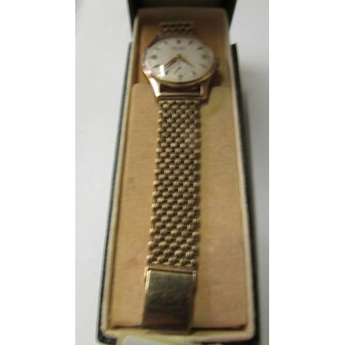 195 - A 1950's 9ct gold Rolex Precision wrist watch with 9ct gold bracelet and spare ling (42.9 grams), in... 