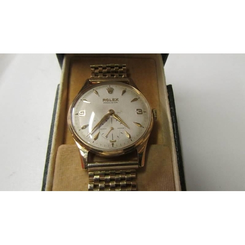 195 - A 1950's 9ct gold Rolex Precision wrist watch with 9ct gold bracelet and spare ling (42.9 grams), in... 