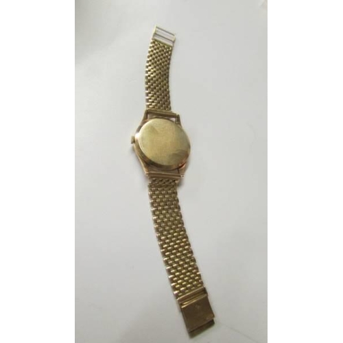 195 - A 1950's 9ct gold Rolex Precision wrist watch with 9ct gold bracelet and spare ling (42.9 grams), in... 