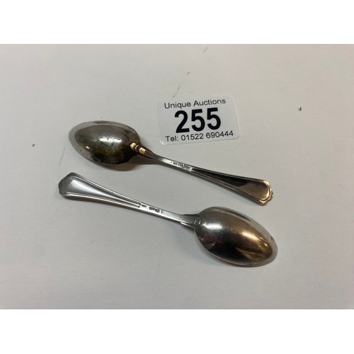 255 - Two Adolf Hitler small spoons, marked AH, 800 silver, (approx 16g)