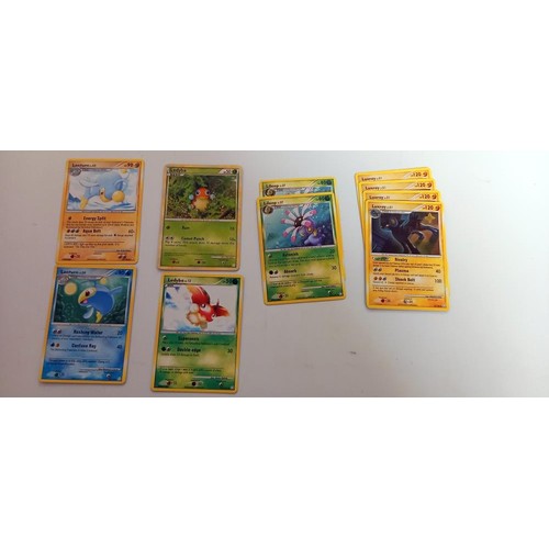 907 - A quantity of Pokemon cards in steam seige box.