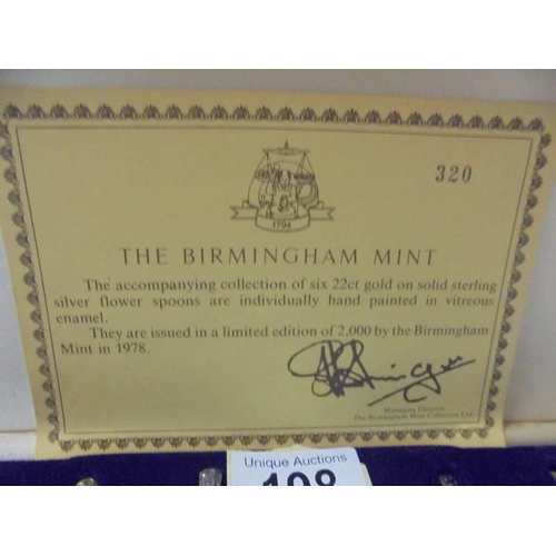 198 - A cased set of The Birmingham Mint  gold plate on silver floral enamel spoons.