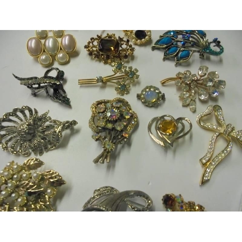 247 - A collection of old paste set brooches including 2 marquasite examples etc., 20 in total.