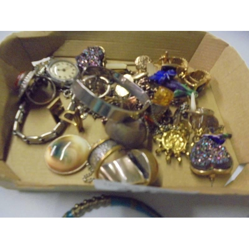 248 - A box of assorted jewellery including some silver.