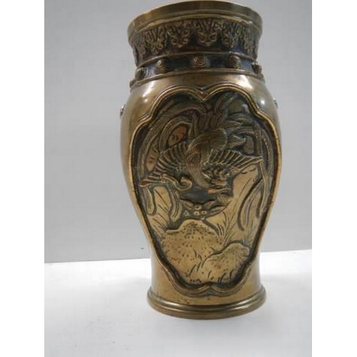 290 - A Chinese Bronze vase decorated with relief birds.