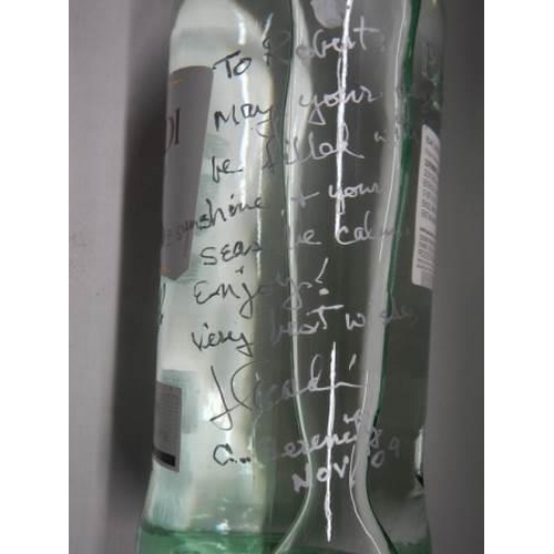 292 - A bottle of Bacardi signed by J Barcardi.