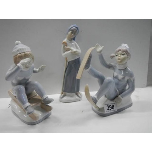 298 - Three Lladro style figures.