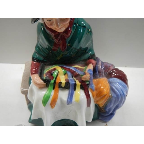 304 - A Royal Doulton figure - Silk and Ribbons HN2017