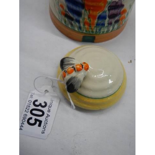 305 - A Clarice Cliff conserve pot with lid, in good condition.