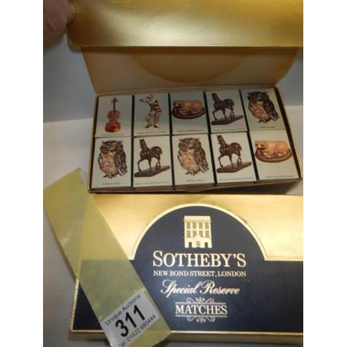 311 - Two boxes of Sotheby's matches, 10 packs in each box and all complete and unused.