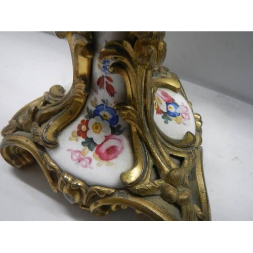 331 - A 19th century French style ormolu mounted hand painted porcelain candlestick.