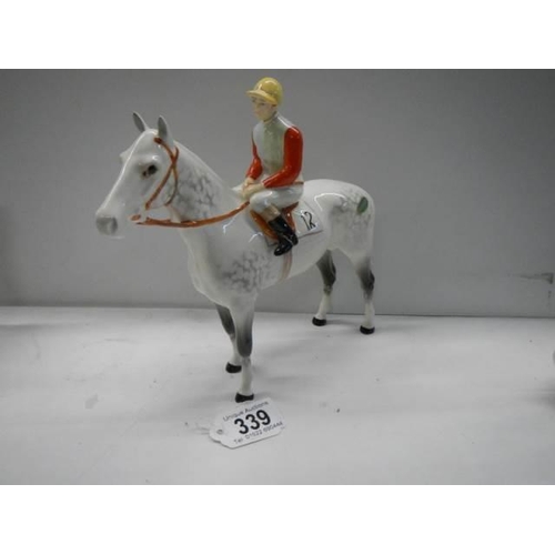 339 - A Beswick dapple grey racehorse with jockey, No.1862, 23 cm