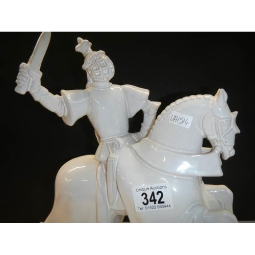 342 - A ceramic figure of a Samouri soldier on a horse.