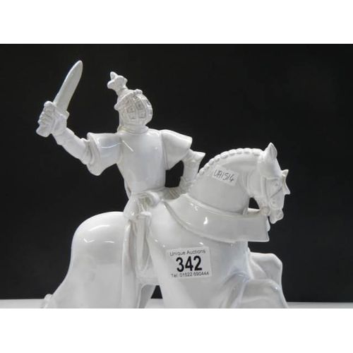 342 - A ceramic figure of a Samouri soldier on a horse.