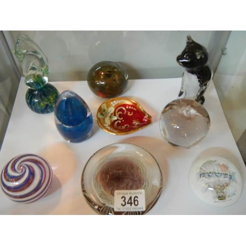 346 - A mixed lot of glass paperweights etc.,