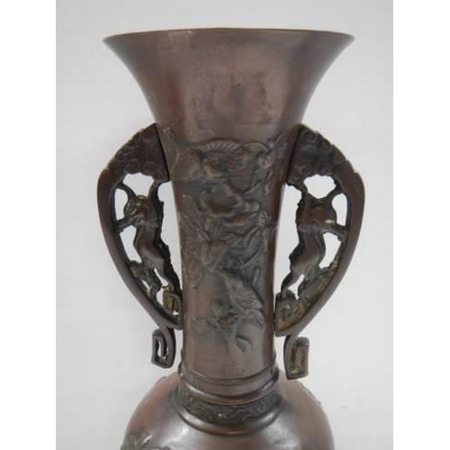 353 - A Japanese bronze vase, 31 sm.