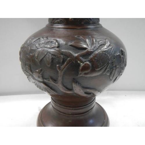 353 - A Japanese bronze vase, 31 sm.