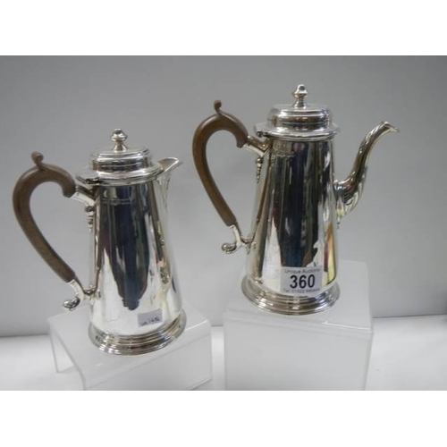 360 - A George Howson silver coffee pot and water pot, Sheffield 1934 (approximately 800 grams).