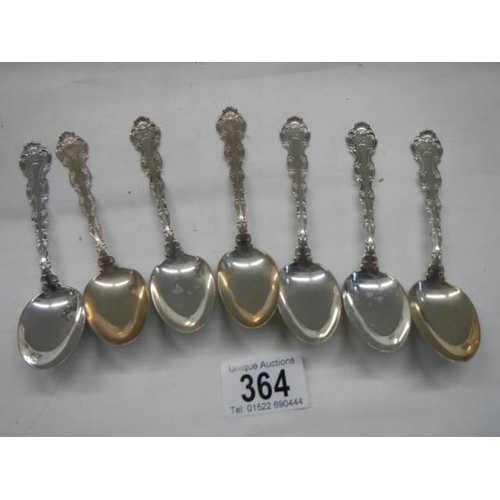 364 - Seven sterling silver tea spoons.  146 grams.