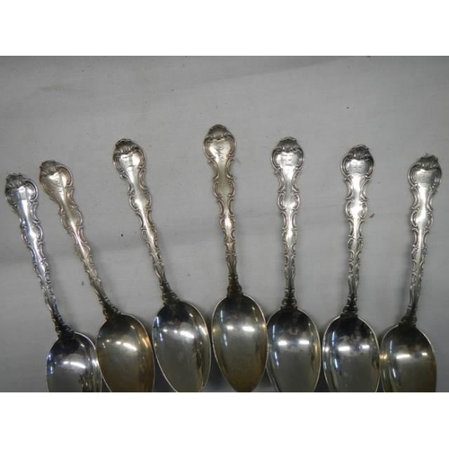 364 - Seven sterling silver tea spoons.  146 grams.