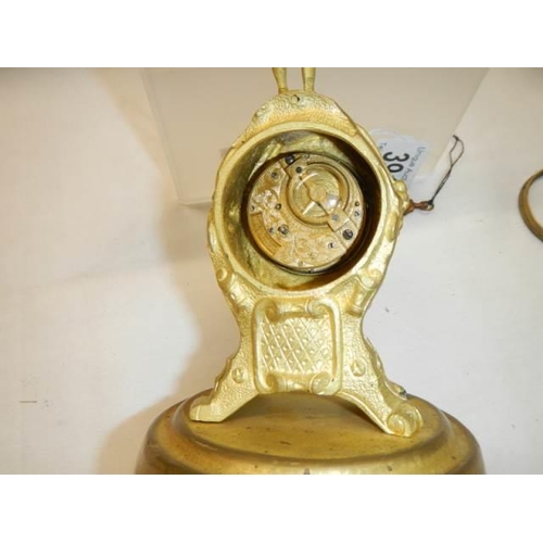 391 - A superb quality 19th century clock surmounted with a male figure by Thos. Whitfield.