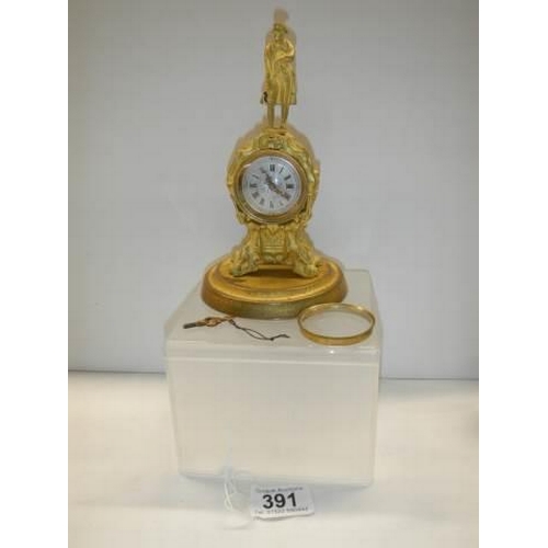 391 - A superb quality 19th century clock surmounted with a male figure by Thos. Whitfield.