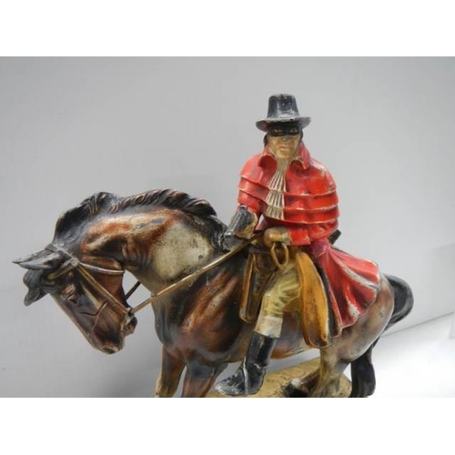 394 - A rare highway man on horse table lighter.