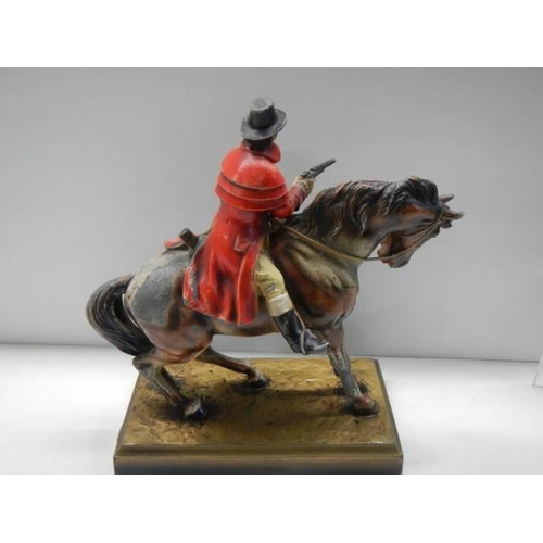 394 - A rare highway man on horse table lighter.