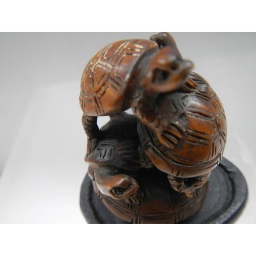 395 - A late Victorian signed wooden netsuke.