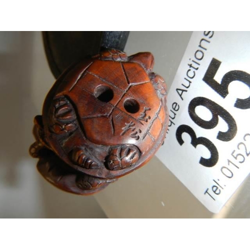 395 - A late Victorian signed wooden netsuke.