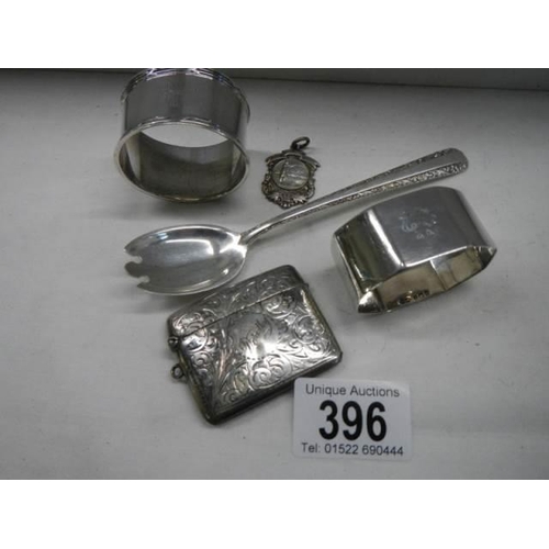 396 - Five items of silver including vesta case, spoon etc.,