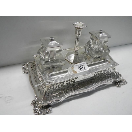 407 - A 19th century silver plate ink stand with glass inkwell, dated 1860.