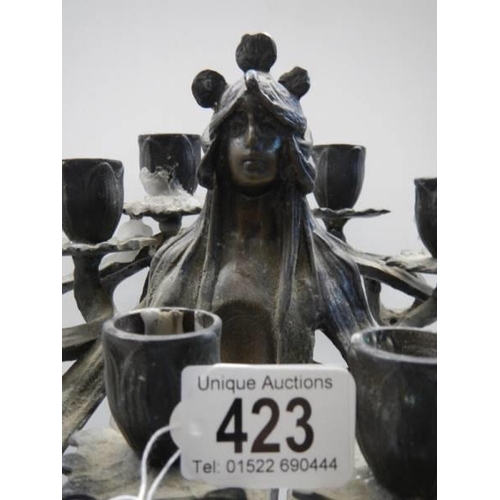 423 - A tall bronze candelabra marked Bate Paris, 46 cm.