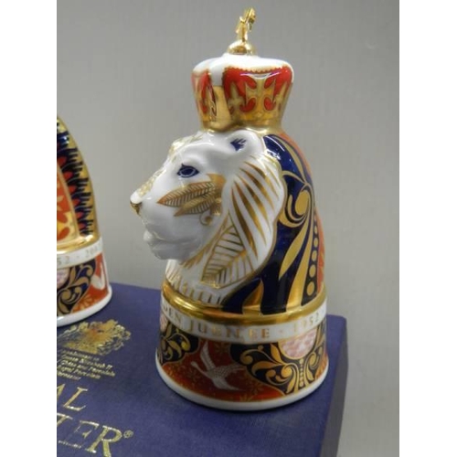 427 - A boxed pair of Royal Worcester candlesnuffers - The Lion and The Unicorn.