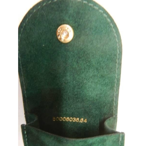 432 - A small pouch marked Rolex with No. 50006038,64 on inside.