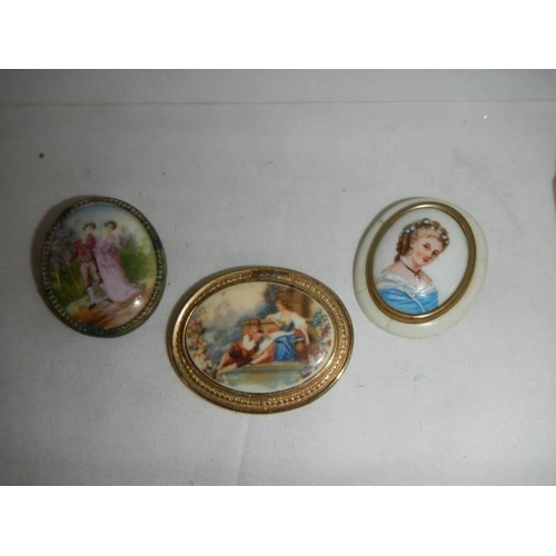 436 - A gilt framed miniature portrait and three other miniatures.