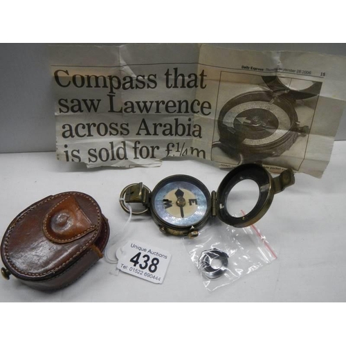 438 - A Swiss made pocket compass in leather pouch, marked Watts & Co., London 1911, No. 782, pouch a/f.