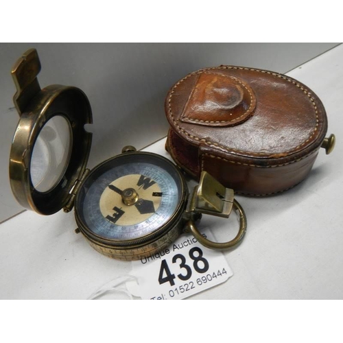 438 - A Swiss made pocket compass in leather pouch, marked Watts & Co., London 1911, No. 782, pouch a/f.