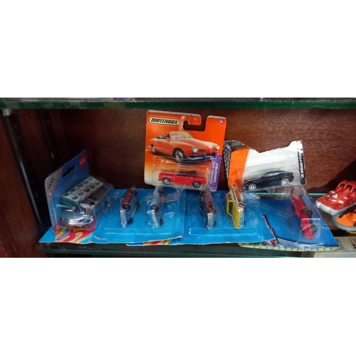 2073 - A quantity of mixed die cast including Matchbox, Siku & Transformers etc