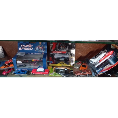 2073 - A quantity of mixed die cast including Matchbox, Siku & Transformers etc