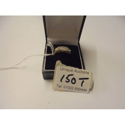 150T - A silver gilt ring set five clear stones, size P.