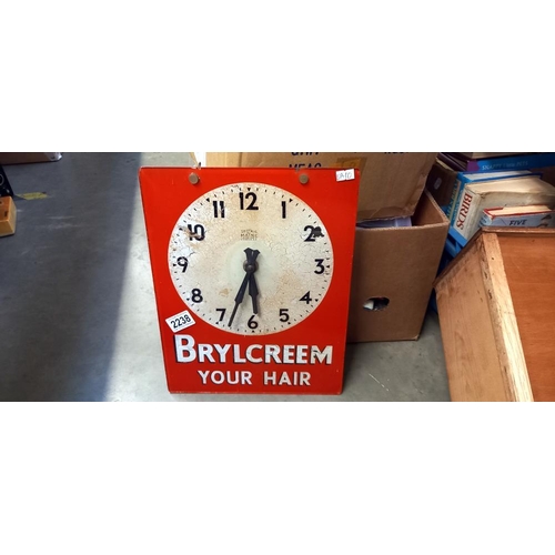 2238 - Vintage glass electric Brylcreem advertising clock (needs to be re-wired) (28cm x 36cm)